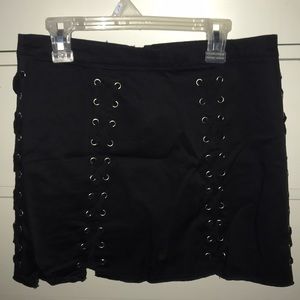 NEVER WORN. Black lace up mini skirt